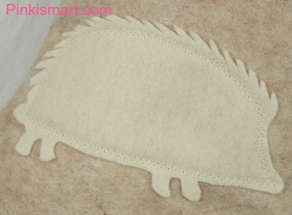 Hedgehog Christmas Stocking Sandstone with Ivory Applique Close-up Published